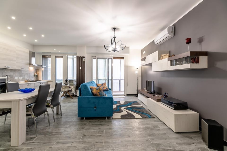 TV and multimedia, Kitchen or kitchenette, Living room, Seating area, Dining area, air conditioner