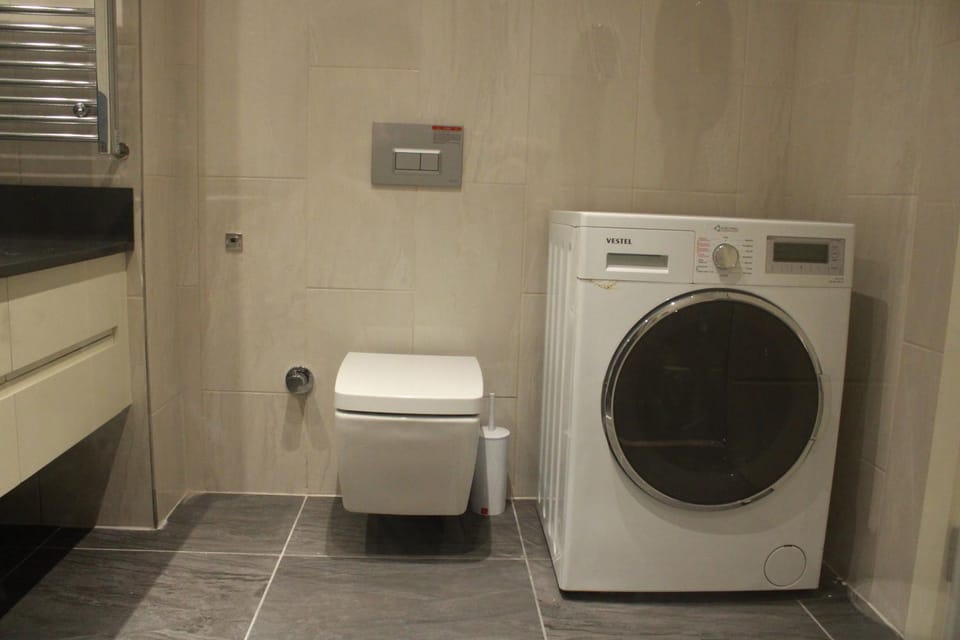 Bathroom, washing machine, dryer