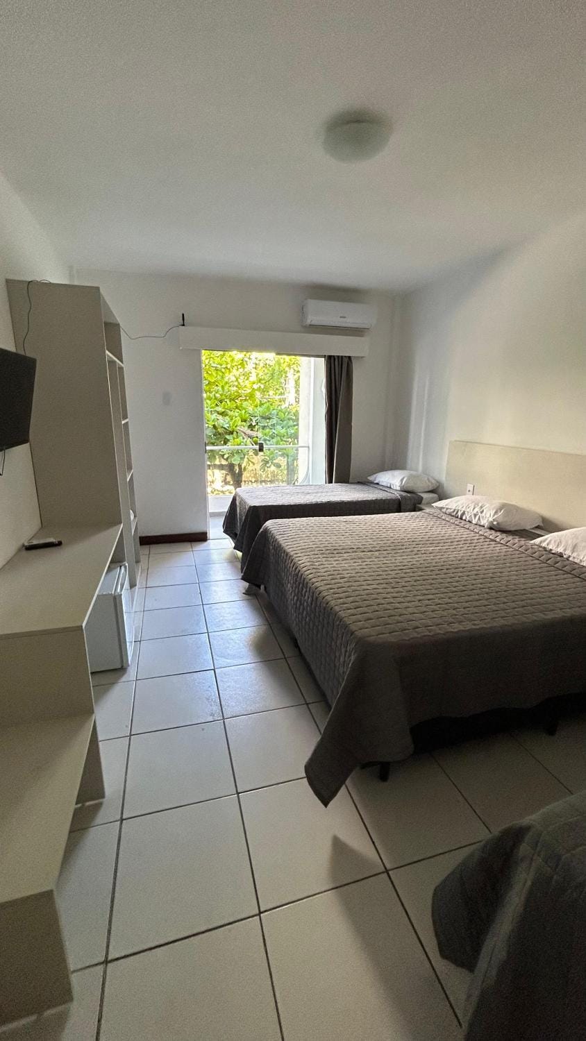 Bed, Bathroom, TV and multimedia, locker, minibar, towels, air conditioner
