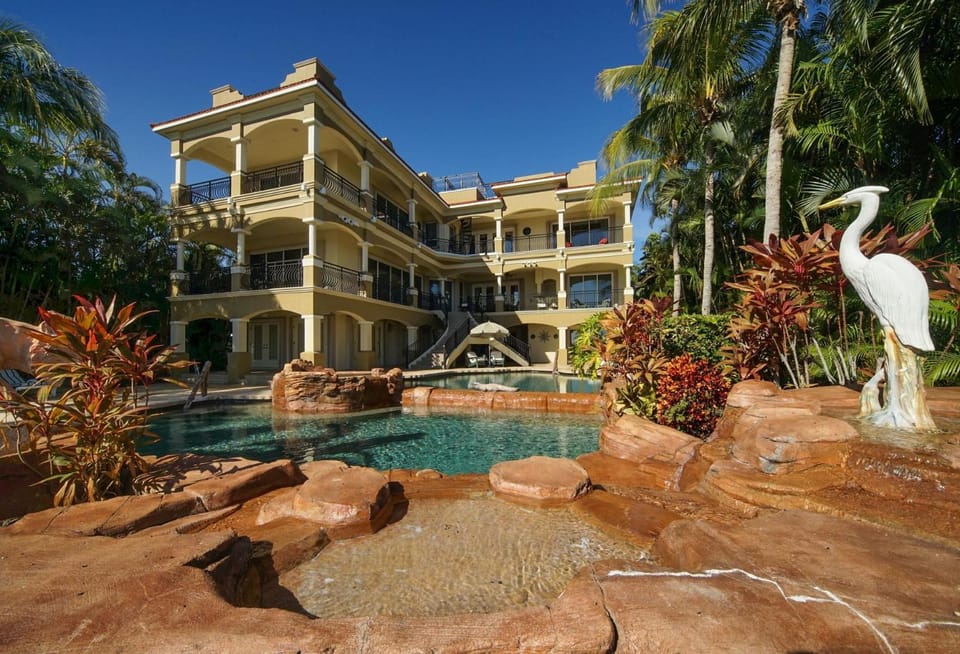 The Winslet Estate offers 5BR luxury, waterfront views, pool, spa, and game room - SWFL Rentals Villa in Cape Coral