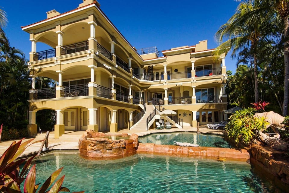 The Winslet Estate offers 5BR luxury, waterfront views, pool, spa, and game room - SWFL Rentals Villa in Cape Coral