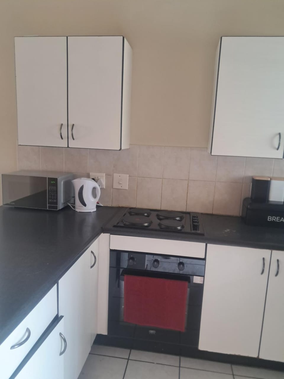 Kitchen or kitchenette, stove