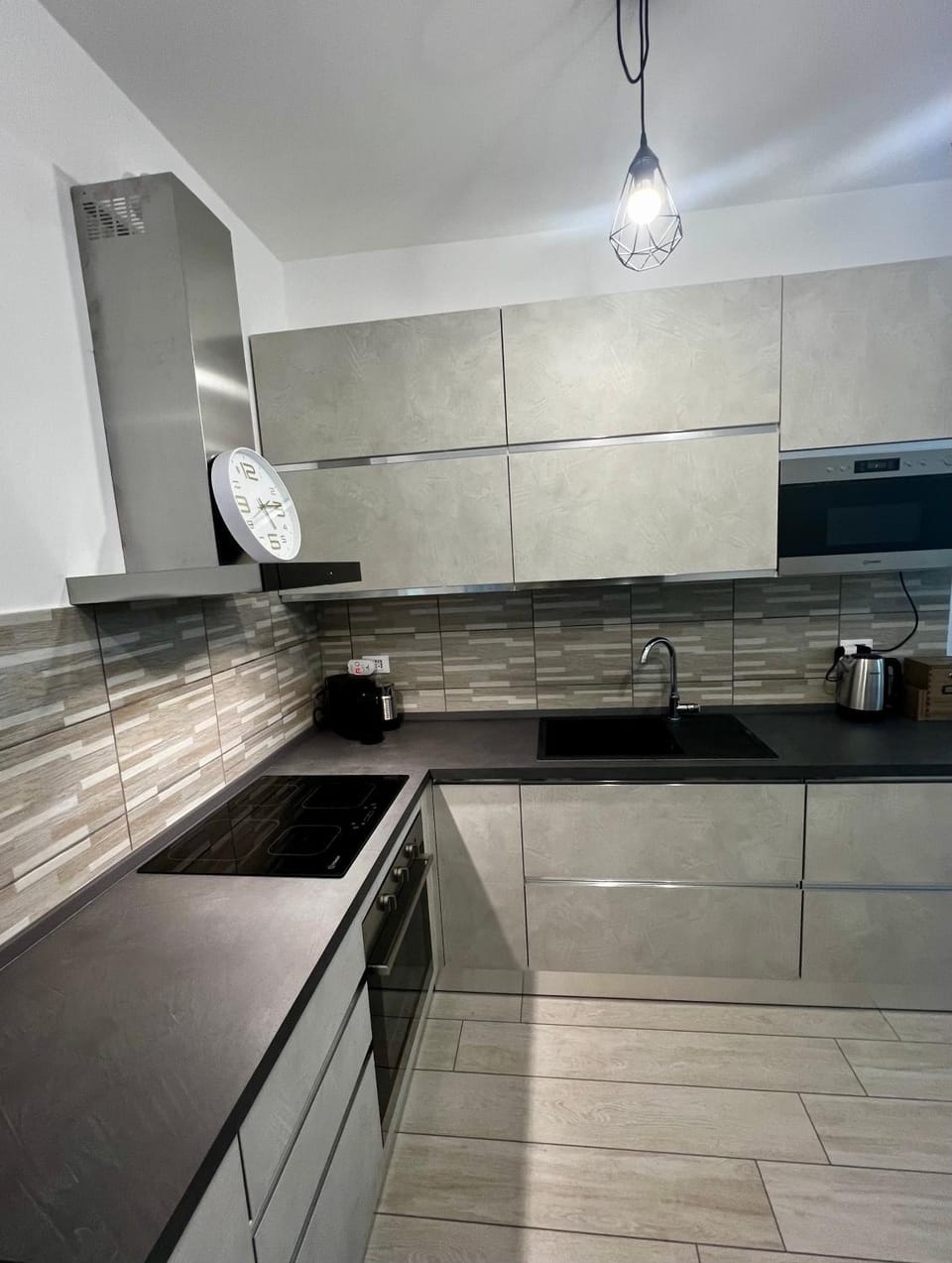 Kitchen or kitchenette, dishwasher, microwave, stove