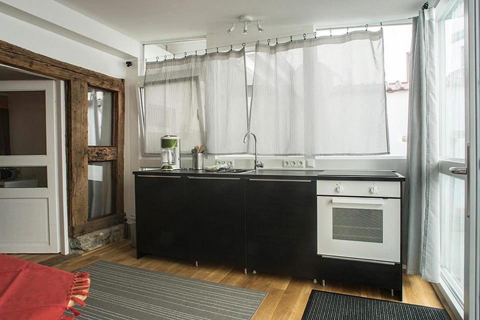 Kitchen or kitchenette, oven, stove