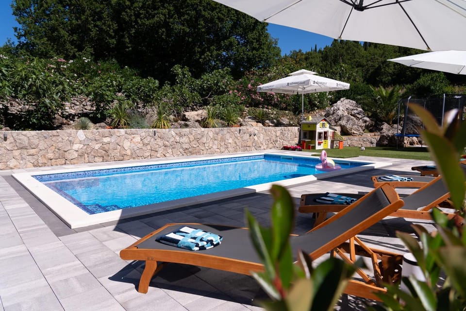 Patio, Day, Pool view, Swimming pool, sunbed