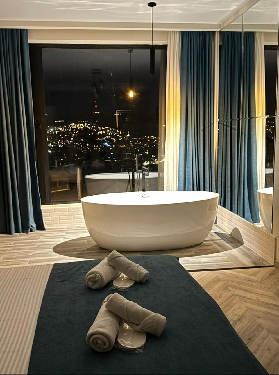 Bed, Night, Bathroom, City view, towels