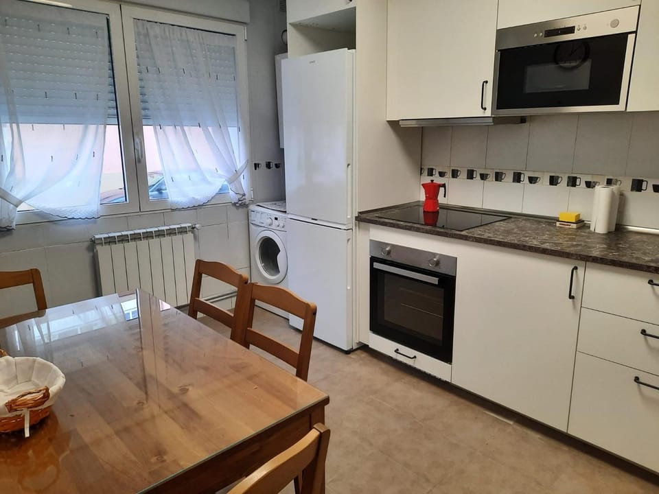 Kitchen or kitchenette, oven