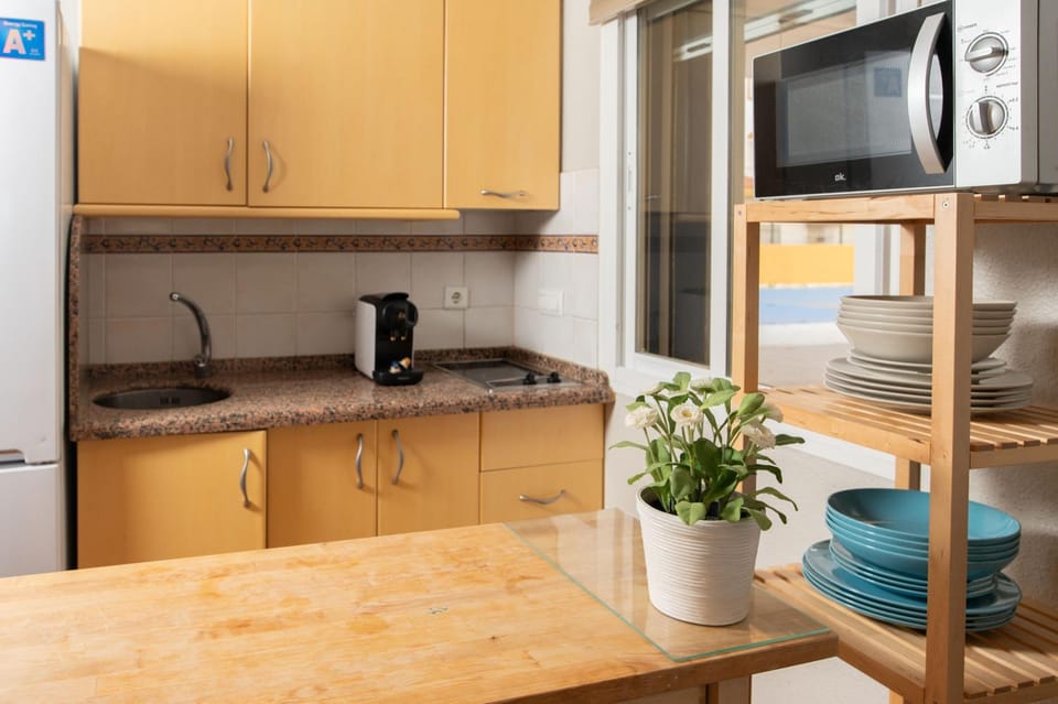 Kitchen or kitchenette, stove