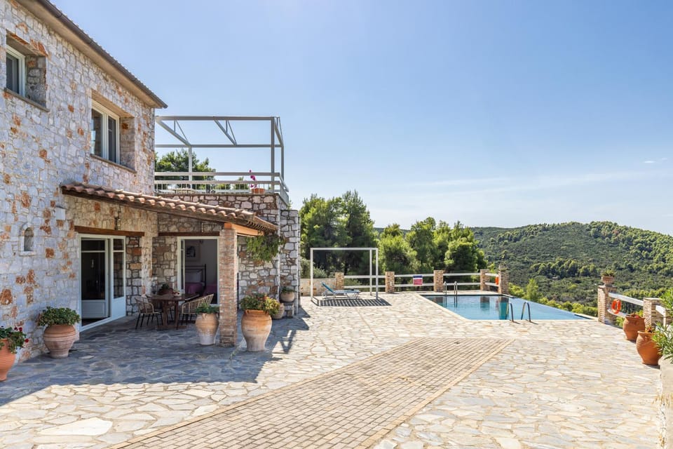 Property building, Patio, Natural landscape, View (from property/room), Pool view, Swimming pool