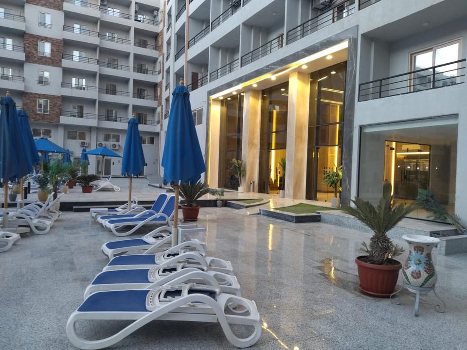 Property building, Patio, Swimming pool