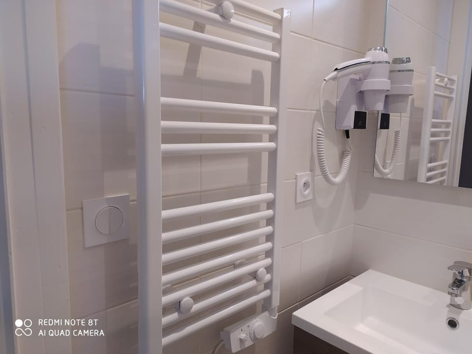 Shower, Bathroom, hair dryier, towels