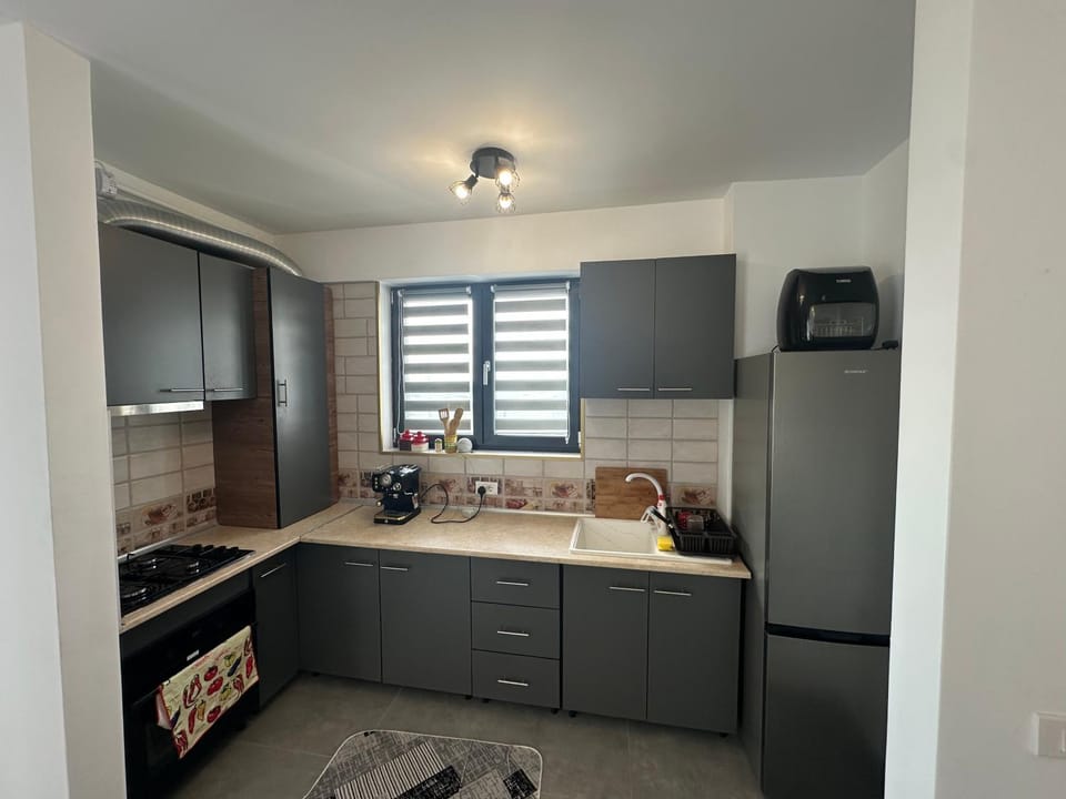 Kitchen or kitchenette, oven