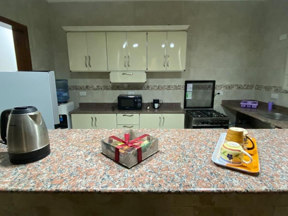 Stylish apartment steps from AUC families only Apartment in New Cairo City