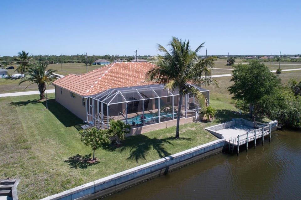 Gulf access & pet friendly in a quiet neighborhood; Great for families! Villa Ellis - SWFL Rentals Villa in Cape Coral