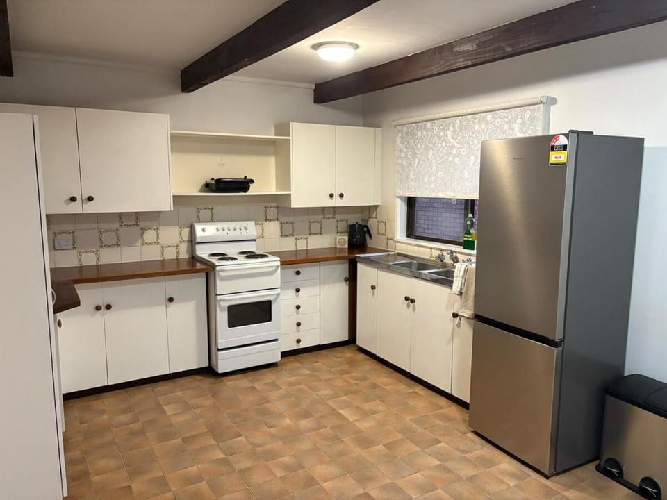 Kitchen or kitchenette, oven, stove, toaster