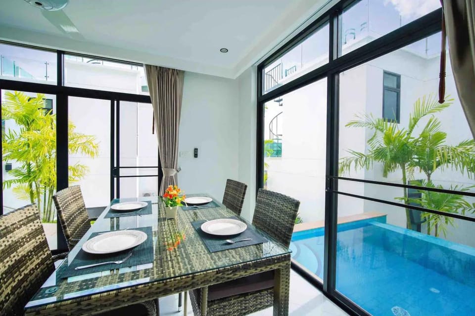 Living room, Seating area, Dining area, Pool view, Swimming pool