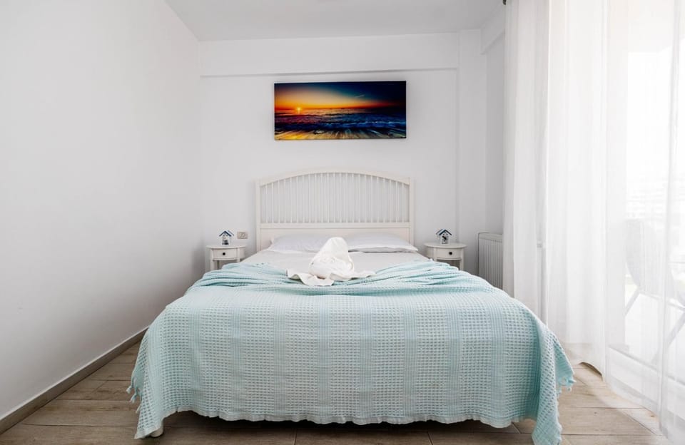 Bed, Day, Seating area, Bedroom