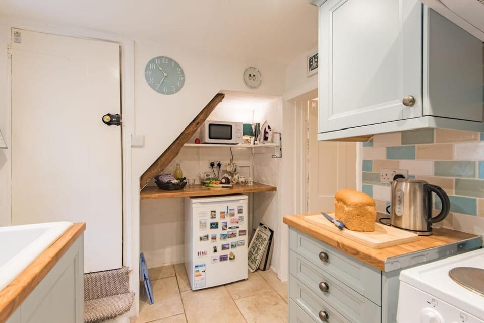Kitchen or kitchenette, oven, stove, toaster