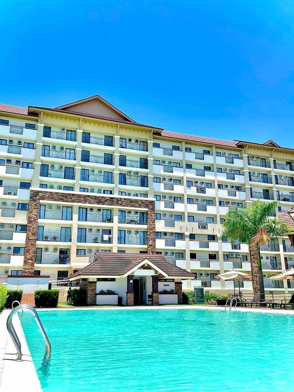Property building, Day, Pool view, Swimming pool