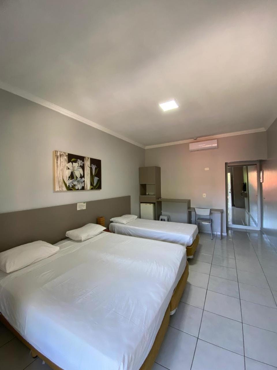 Photo of the whole room, air conditioner