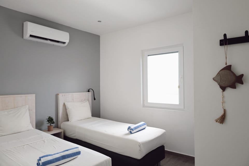 Bed, Photo of the whole room, Bedroom, towels, air conditioner