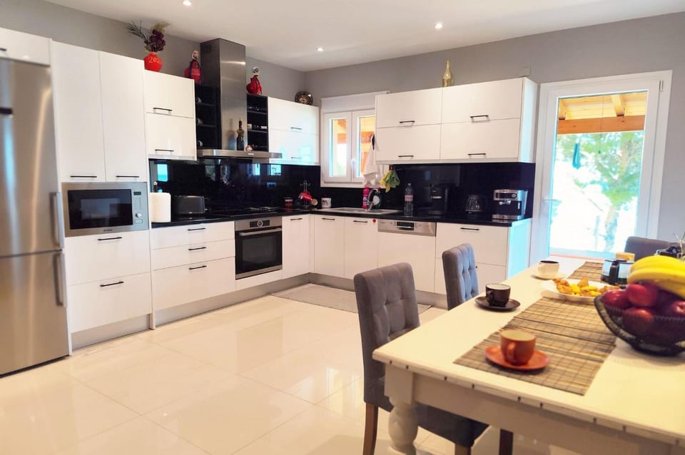 Dining area, dishwasher, microwave, oven, kitchen
