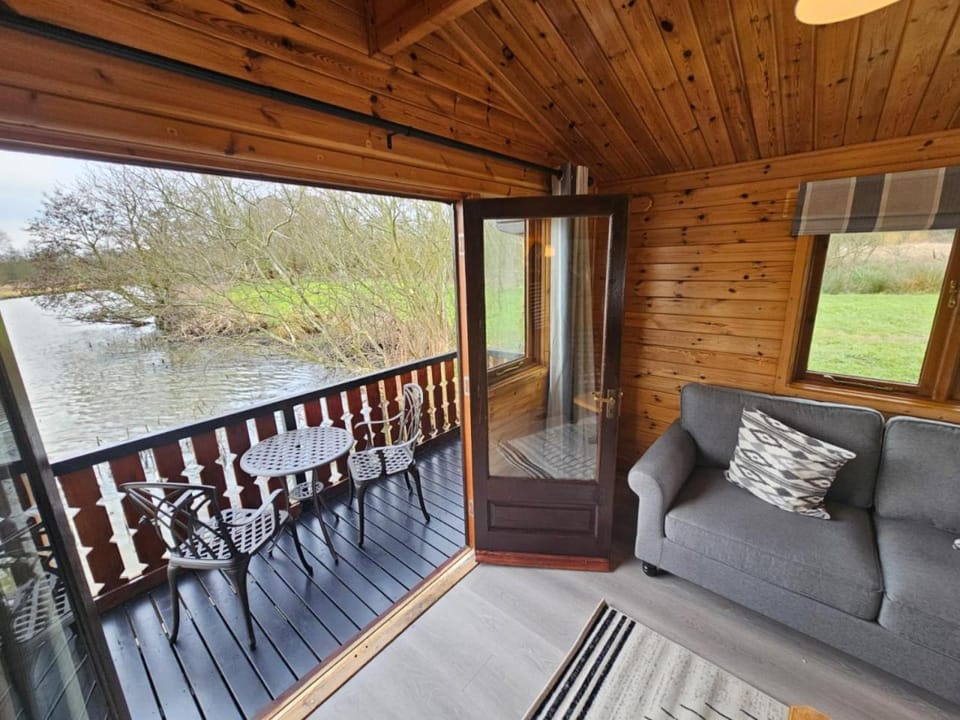 Wroxham Broads Lodge Houseboat Docked boat in Broadland District