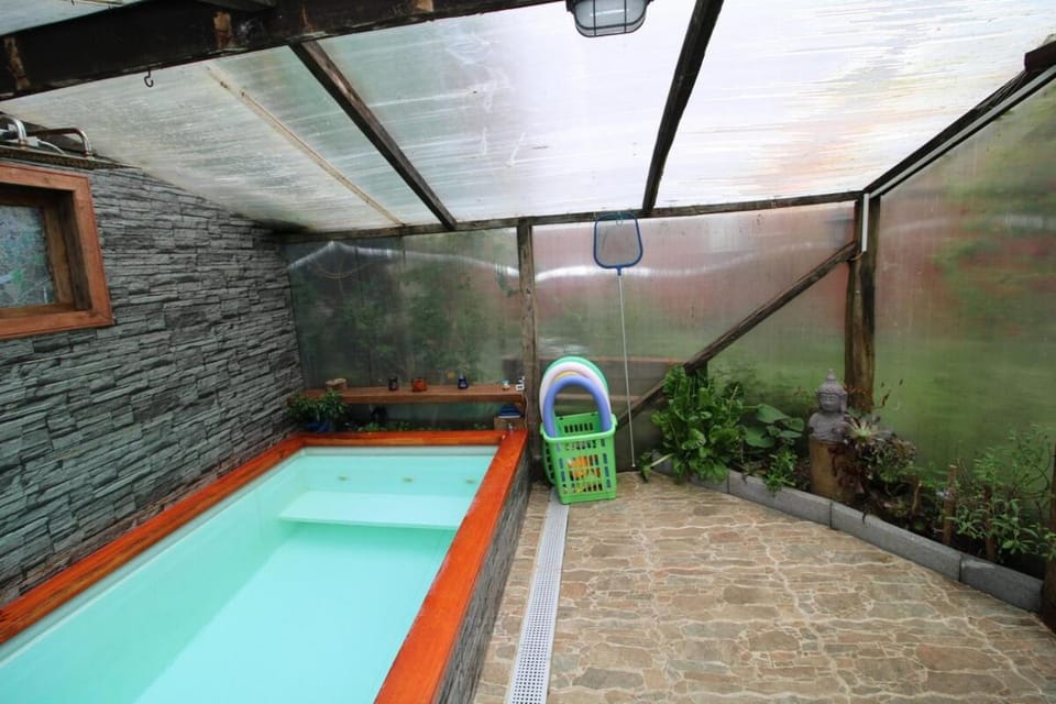 Habitación cocina y Quincho con Piscina temperada Apartment in Los Lagos, Chile