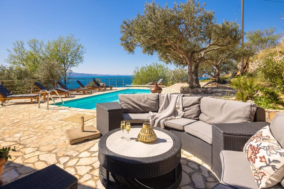 Patio, Day, Garden, Seating area, Garden view, Pool view, Sea view, Swimming pool, sunbed