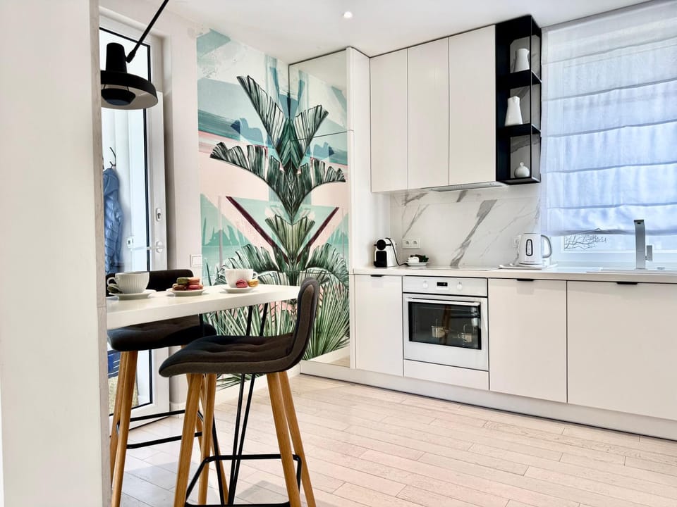 Kitchen or kitchenette, dishwasher, oven, stove