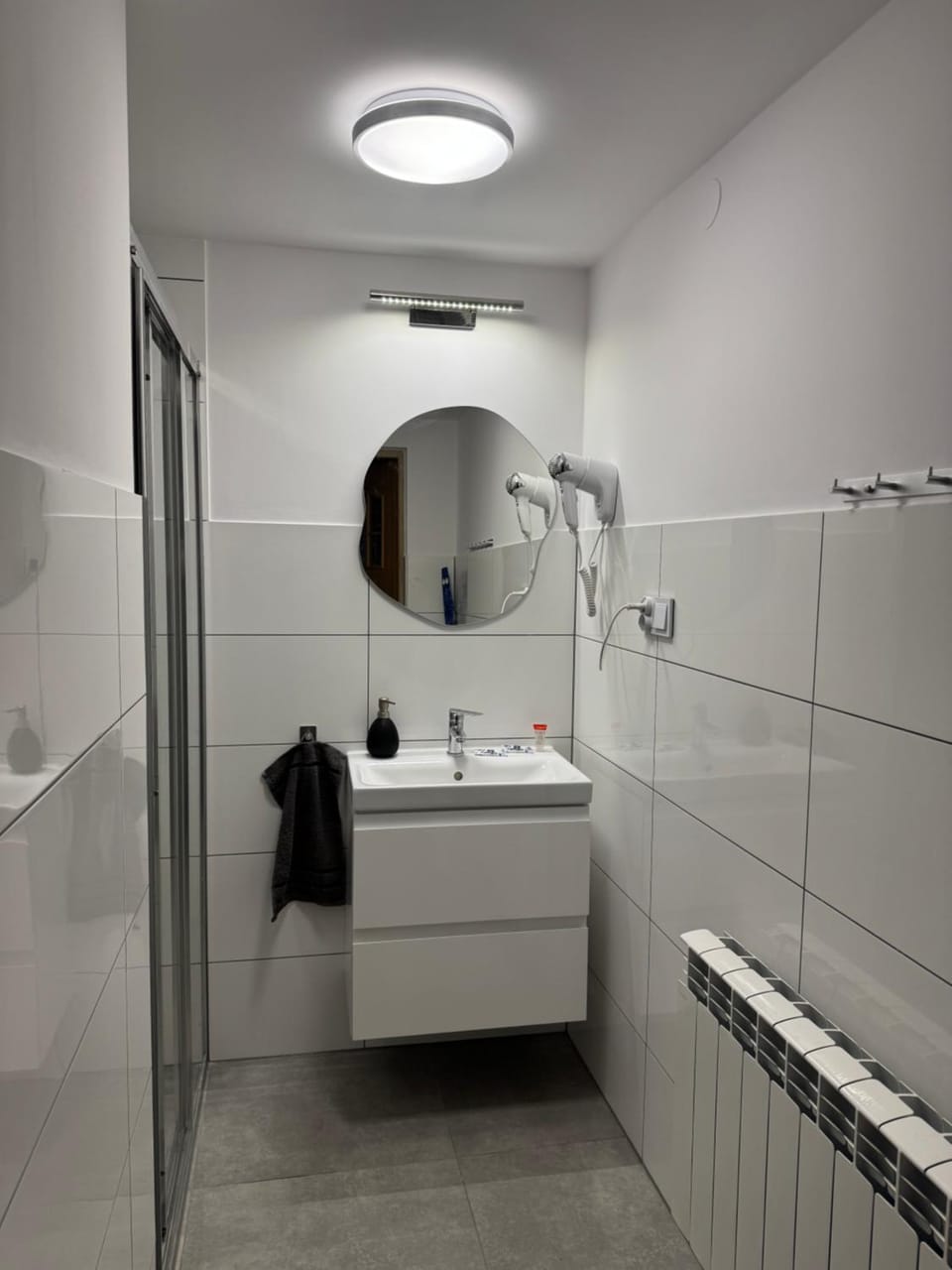 Shower, Bathroom, hair dryier, towels, dryer