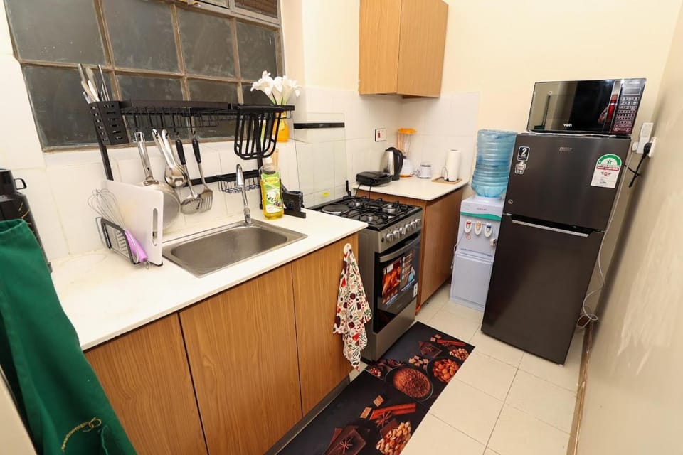 Kitchen or kitchenette, dishwasher, oven, toaster