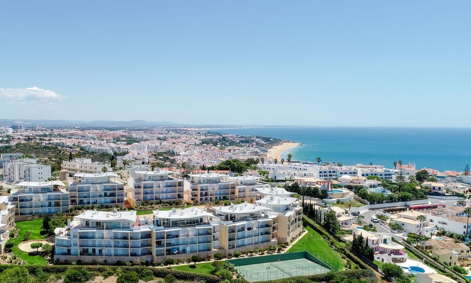 Property building, Nearby landmark, Day, Natural landscape, Bird's eye view, Beach, City view, Sea view, Location