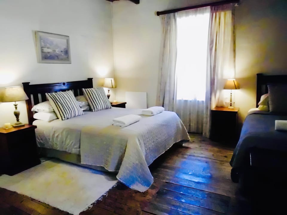 Bed, Bedroom, hair dryier, towels, wardrobe