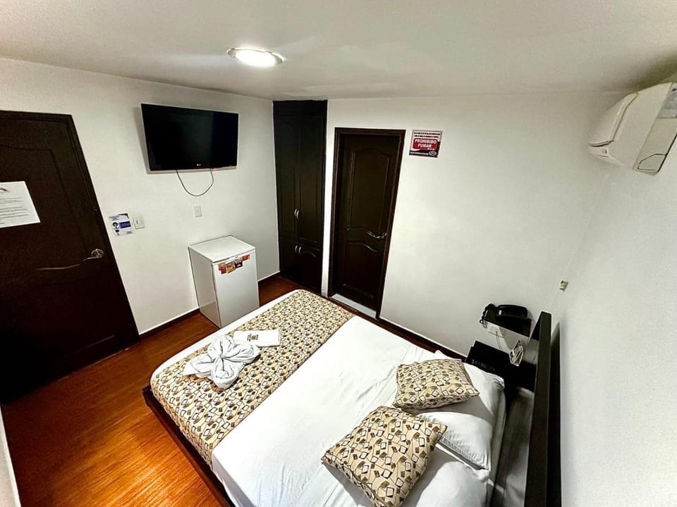 Property building, TV and multimedia, Bedroom, towels, air conditioner
