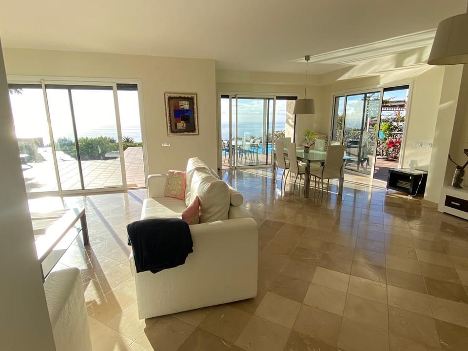Living room, Seating area, Sea view, Swimming pool