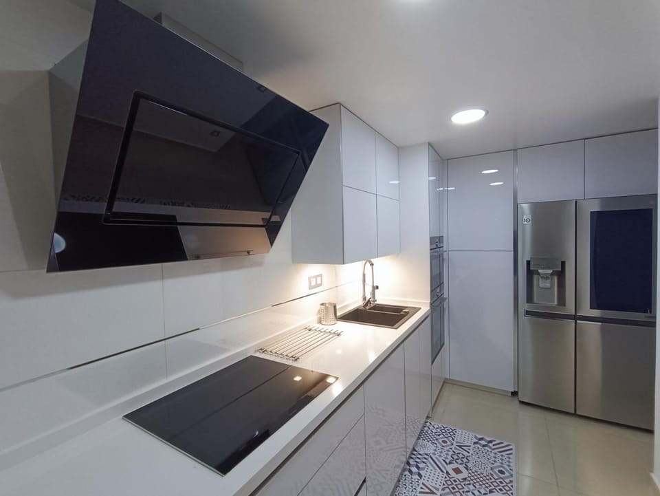 Kitchen or kitchenette, microwave, oven, stove, kitchen
