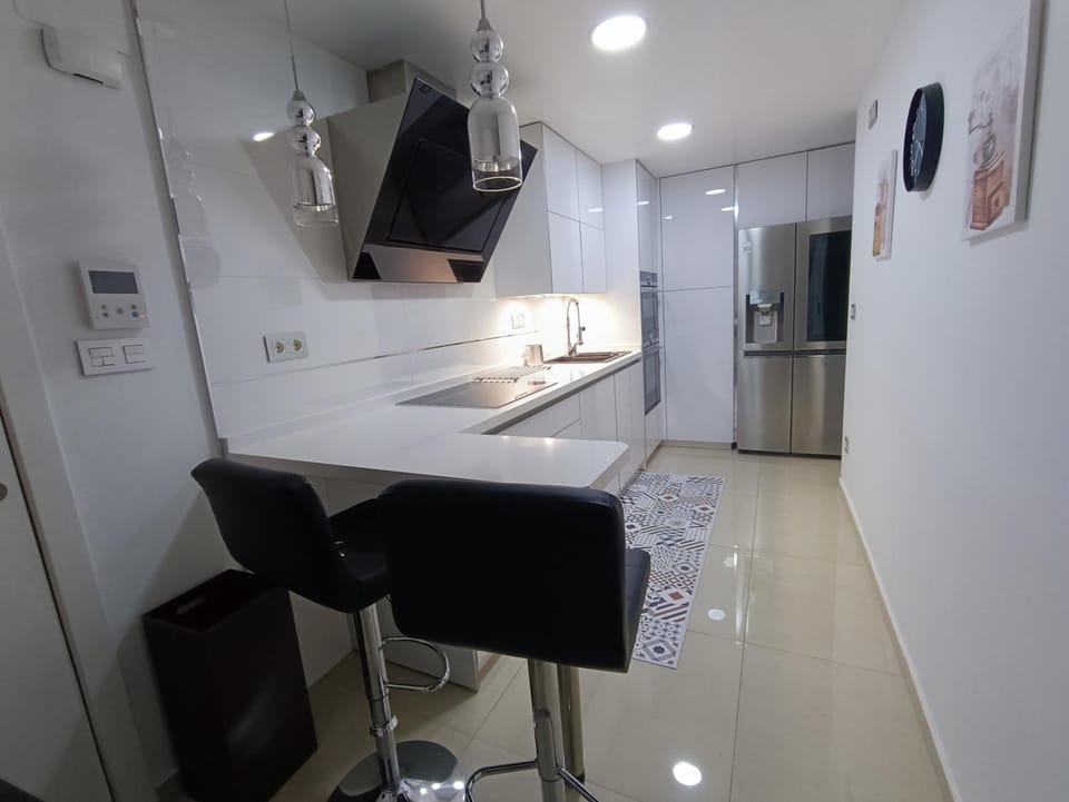 Kitchen or kitchenette, stove, kitchen