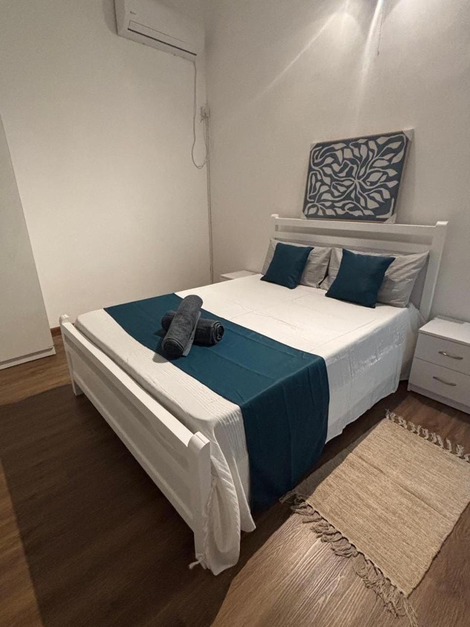 Bed, Photo of the whole room, Bedroom, towels, air conditioner
