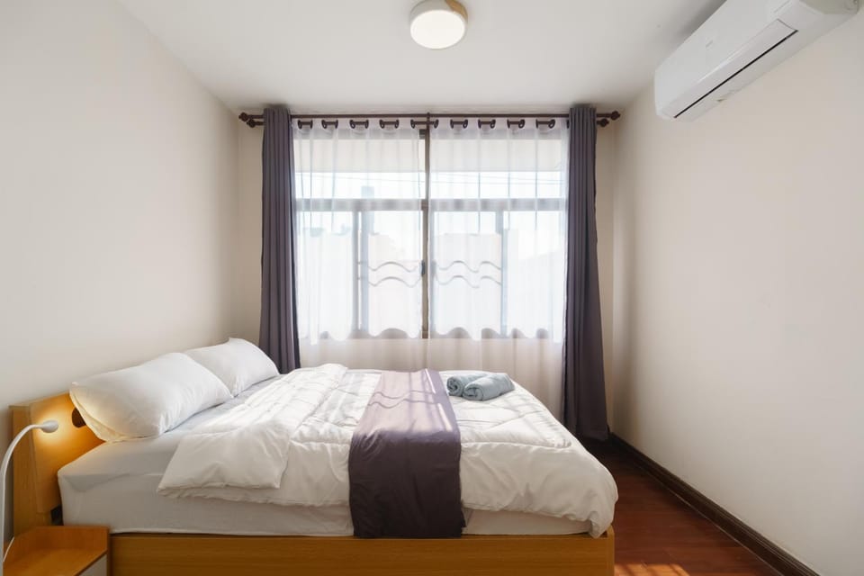 Bed, Photo of the whole room, Bedroom, towels, air conditioner
