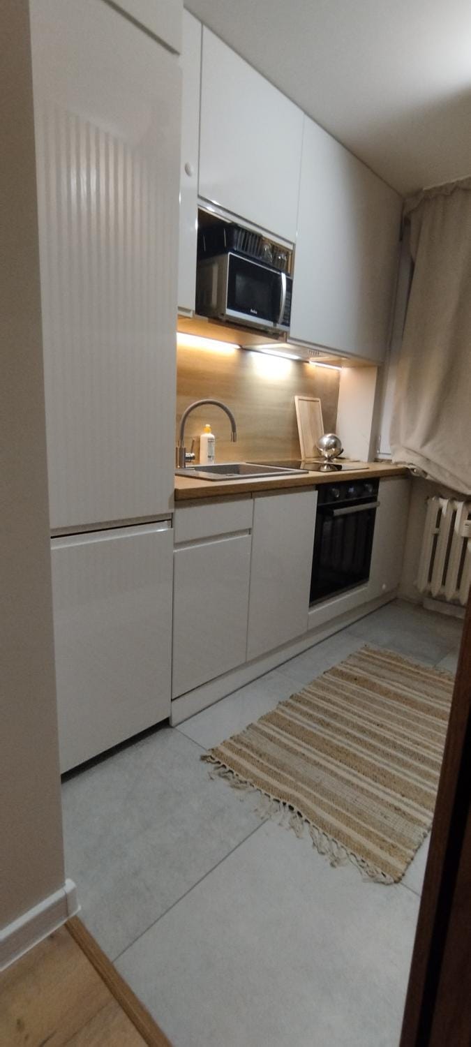 Kitchen or kitchenette, oven, stove