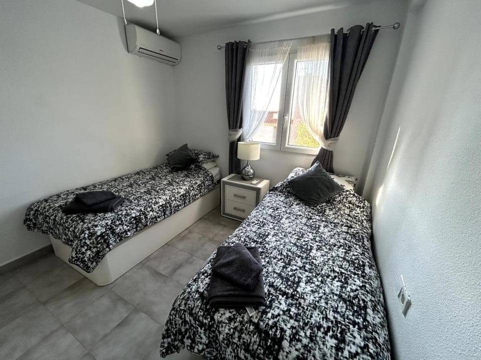 Bed, Photo of the whole room, Bedroom, towels, air conditioner