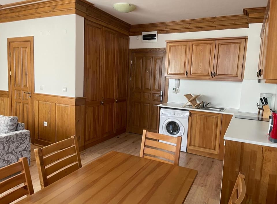 Kitchen or kitchenette, washing machine