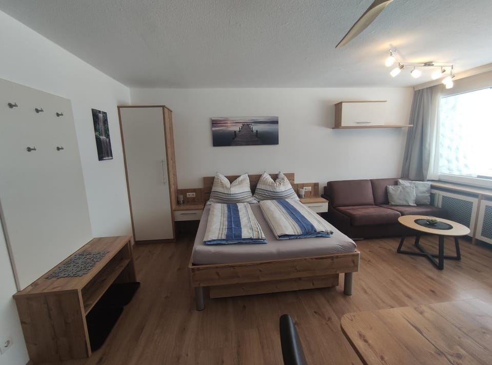Bed, Living room, Photo of the whole room, Seating area, Bedroom, wardrobe