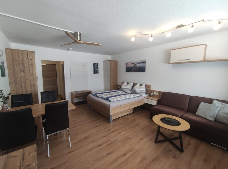 Bed, Living room, Photo of the whole room, Seating area, Bedroom, wardrobe