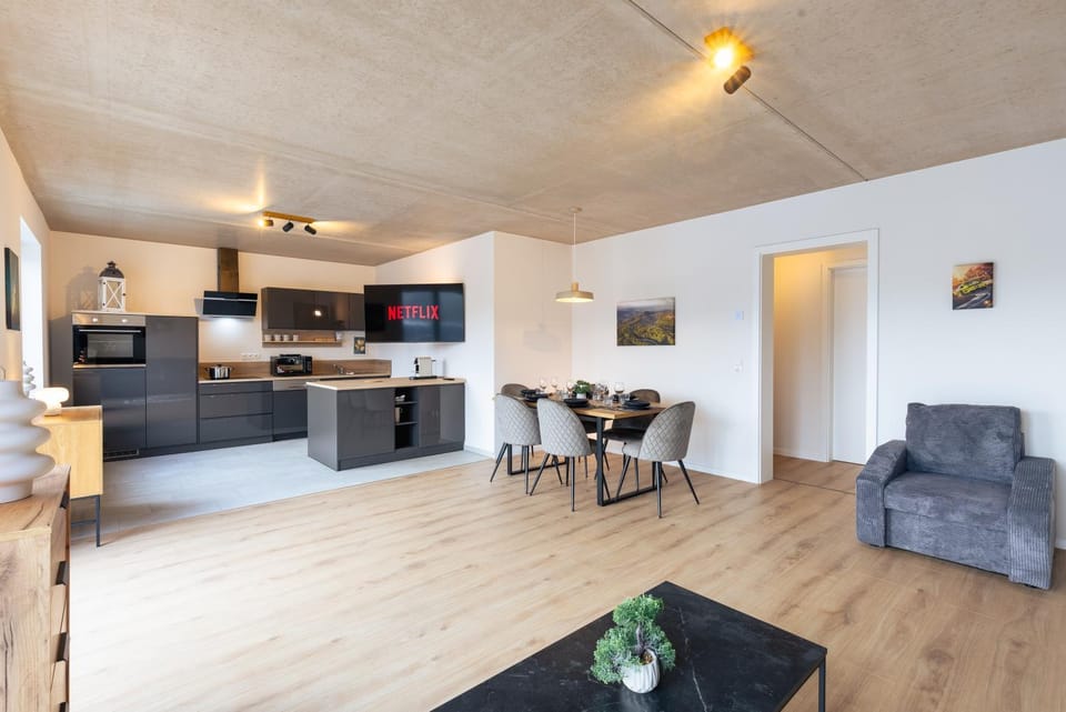 TV and multimedia, Kitchen or kitchenette, Living room, Seating area, Dining area, dishwasher, oven, stove, kitchen