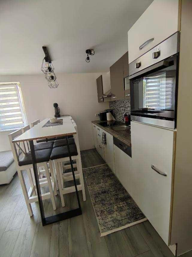 Kitchen or kitchenette, Dining area, dishwasher, oven, stove
