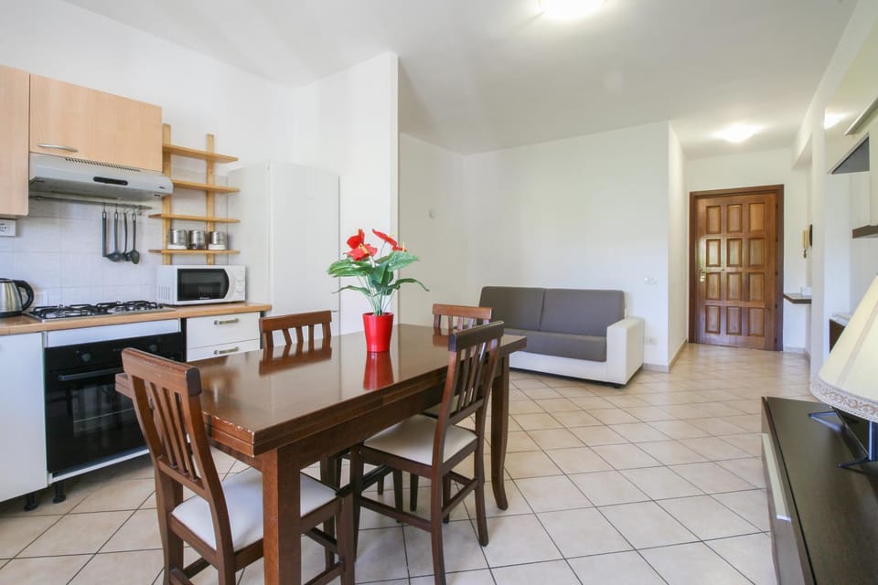 Kitchen or kitchenette, Living room, Seating area, Dining area, dishwasher, oven, stove, toaster