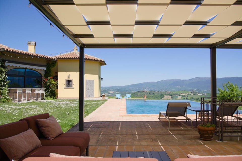 Patio, Day, Natural landscape, Pool view, Swimming pool, sunbed