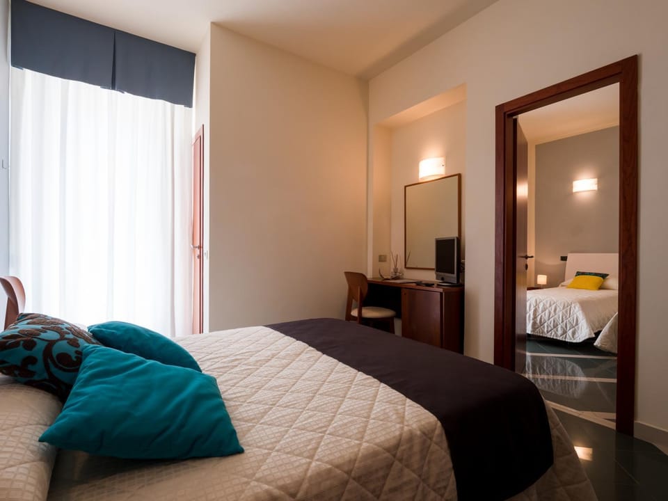 Bed, Day, Seating area, Bedroom